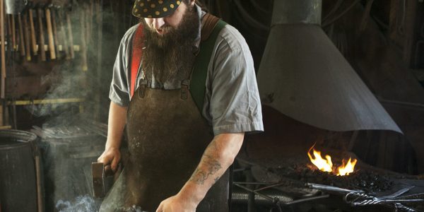 The blacksmith hard at work at the Benjamin Blacksmith Shop.